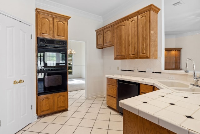 3600 Sawmill Dr, Austin, TX 78749 - kitchen featuring black appliances, tile counters, ornamental molding, light tile patterned flooring, and backsplash