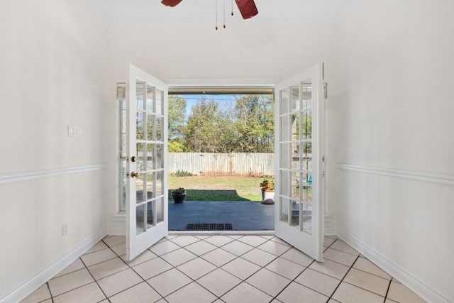 3600 Sawmill Dr, Austin, TX 78749 - entryway with french doors, light tile patterned flooring, and a ceiling fan