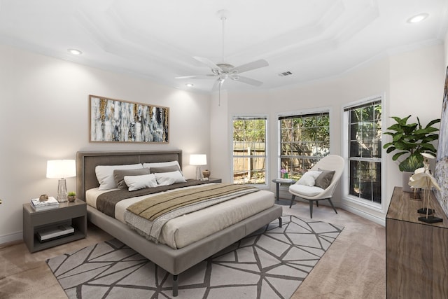 3600 Sawmill Dr, Austin, TX 78749 - bedroom featuring light colored carpet, crown molding, recessed lighting, ceiling fan, and a raised ceiling