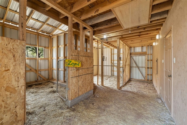 miscellaneous room with high vaulted ceiling