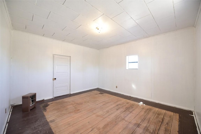 502 S Edinburg St, Marfa, TX 79843 - spare room with hardwood / wood-style floors, heating unit, and baseboards