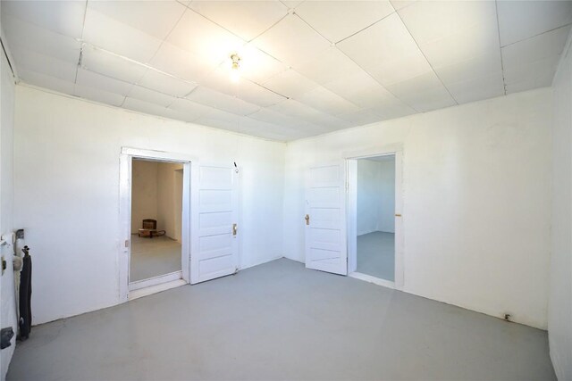 502 S Edinburg St, Marfa, TX 79843 - spare room with finished concrete floors