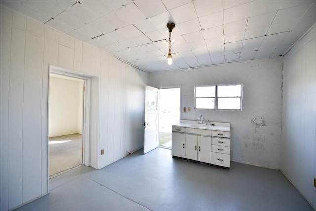 502 S Edinburg St, Marfa, TX 79843 - kitchen with a sink, light countertops, and concrete floors