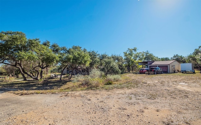 view of yard featuring a garage