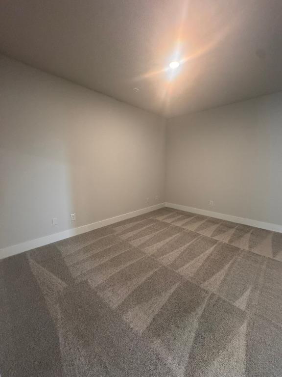 278 Smithsonian Ln, Kyle, TX 78640 - unfurnished room with carpet and baseboards