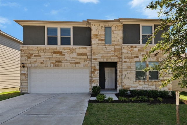 view of front of property with a garage