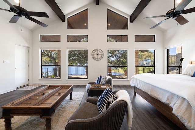 bedroom with multiple windows, ceiling fan, beamed ceiling, and high vaulted ceiling