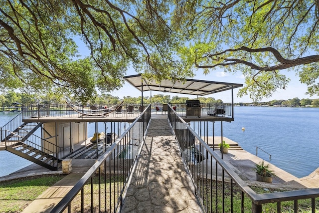 view of dock with a water view