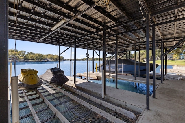 dock area featuring a water view