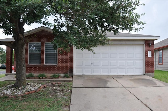 12817 Paloma Blanca Way, Del Valle, TX 78617 - single story home featuring brick siding, concrete driveway, and a garage