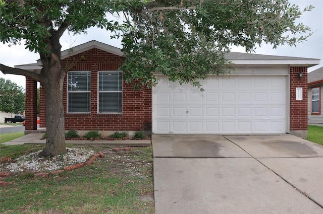 12817 Paloma Blanca Way, Del Valle, TX 78617 - ranch-style home with driveway, an attached garage, and brick siding
