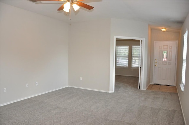 12817 Paloma Blanca Way, Del Valle, TX 78617 - foyer with ceiling fan and carpet flooring