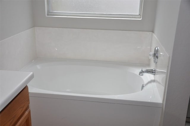 12817 Paloma Blanca Way, Del Valle, TX 78617 - bathroom featuring a bath and vanity