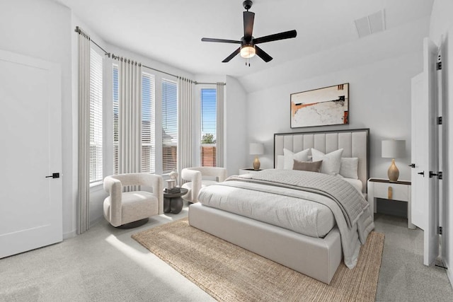 2109 Tobiano Trce, Georgetown, TX 78633 - bedroom featuring multiple windows, baseboards, a ceiling fan, and carpet floors