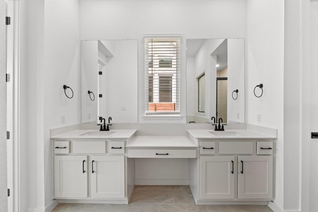 2109 Tobiano Trce, Georgetown, TX 78633 - full bathroom with two vanities and a shower with shower door
