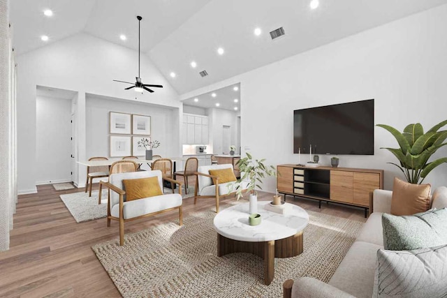 2113 Tobiano Trce, Georgetown, TX 78633 - living area featuring high vaulted ceiling, ceiling fan, light wood-style floors, and recessed lighting