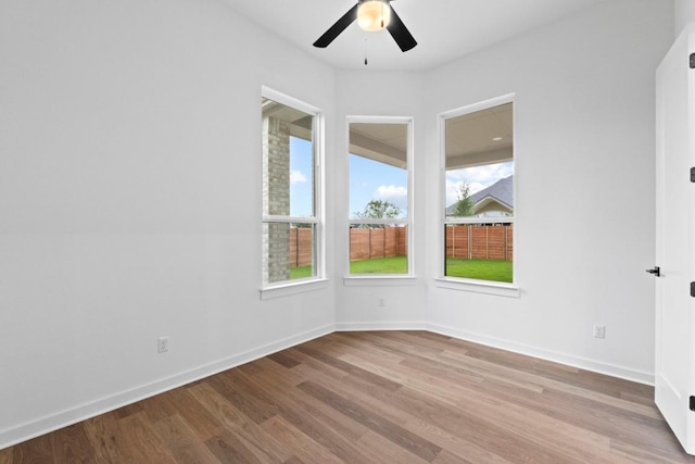 2113 Tobiano Trce, Georgetown, TX 78633 - unfurnished room with wood finished floors and a ceiling fan