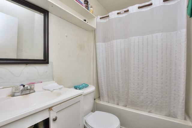 full bathroom with shower / bath combo, vanity, and toilet