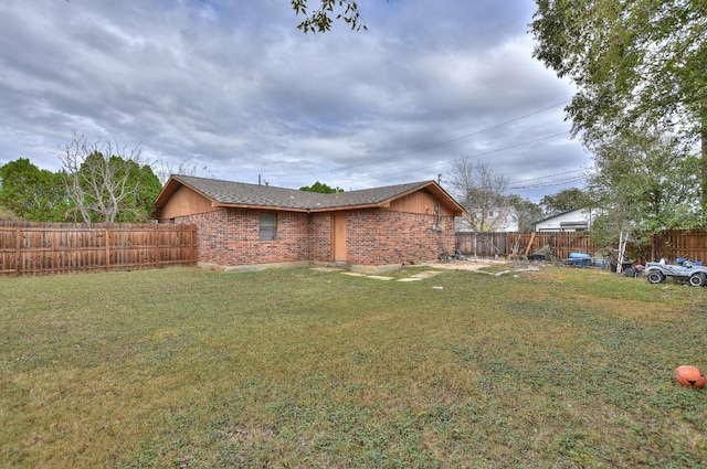 view of property exterior with a lawn