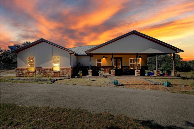 view of front of house with ceiling fan and covered porch