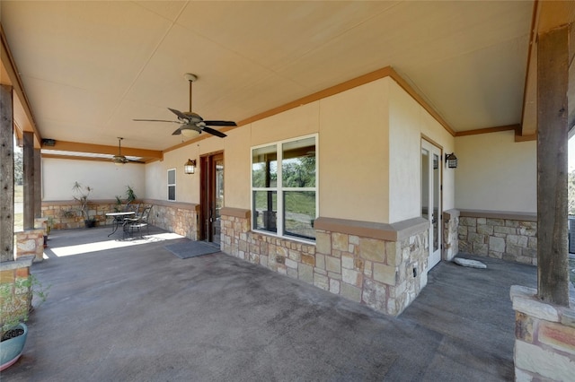 view of patio featuring ceiling fan