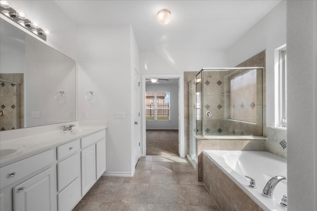 bathroom featuring tile patterned floors, vanity, ceiling fan, and independent shower and bath