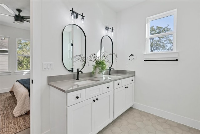 bathroom with vanity and ceiling fan