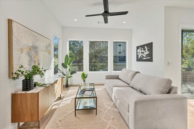 living room featuring ceiling fan