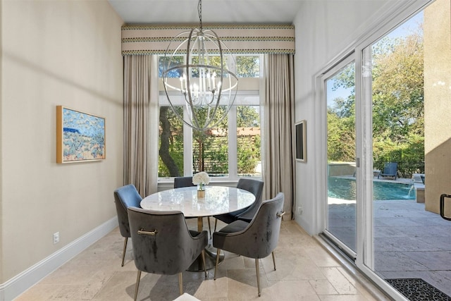 dining room featuring a chandelier