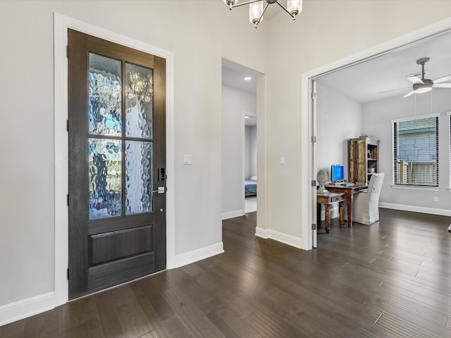 foyer featuring ceiling fan and dark hardwood / wood-style flooring