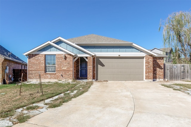 view of front of property with a garage