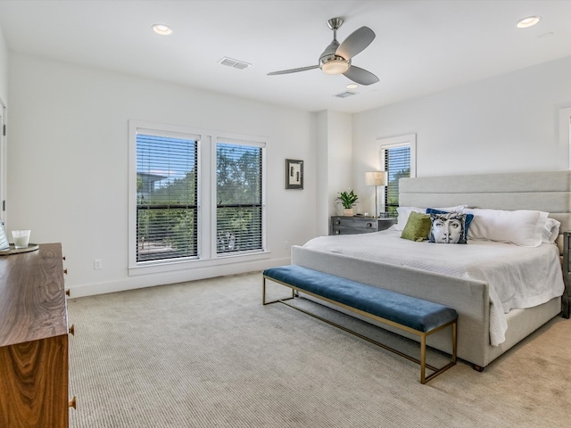 carpeted bedroom featuring ceiling fan