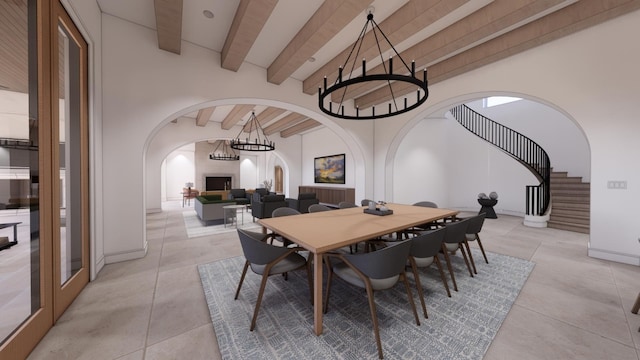 tiled dining room featuring a chandelier and lofted ceiling with beams