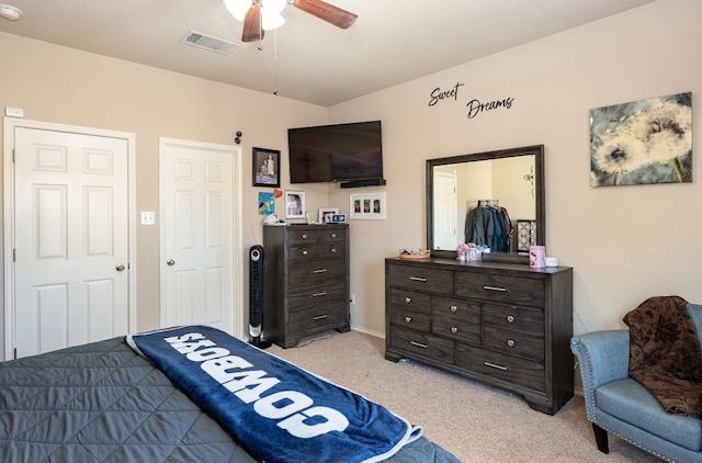 carpeted bedroom with ceiling fan