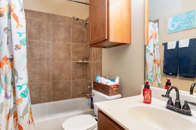 full bathroom featuring shower / bath combo, vanity, and toilet