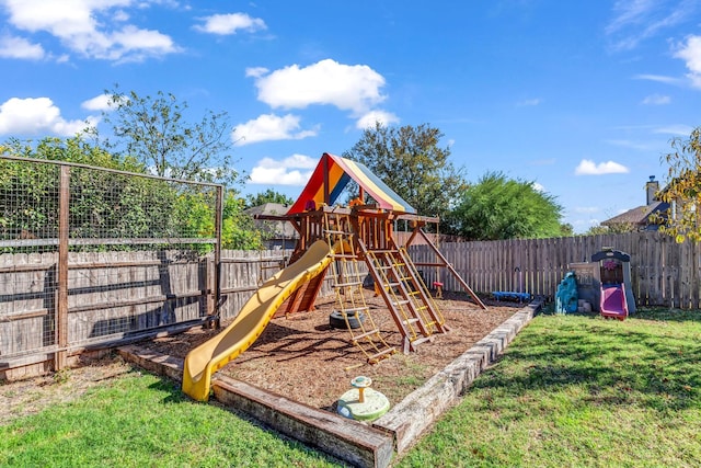 view of jungle gym with a yard