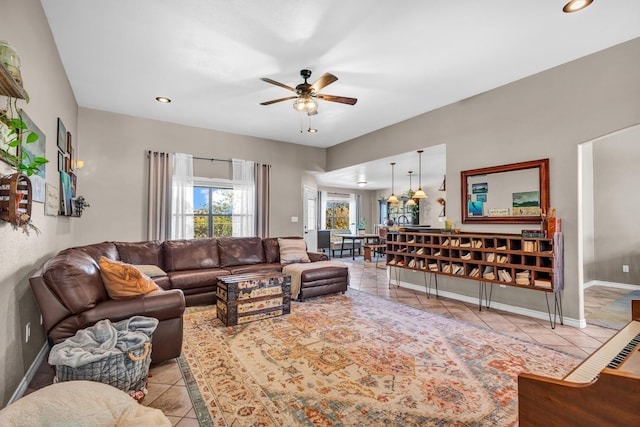 tiled living room featuring ceiling fan