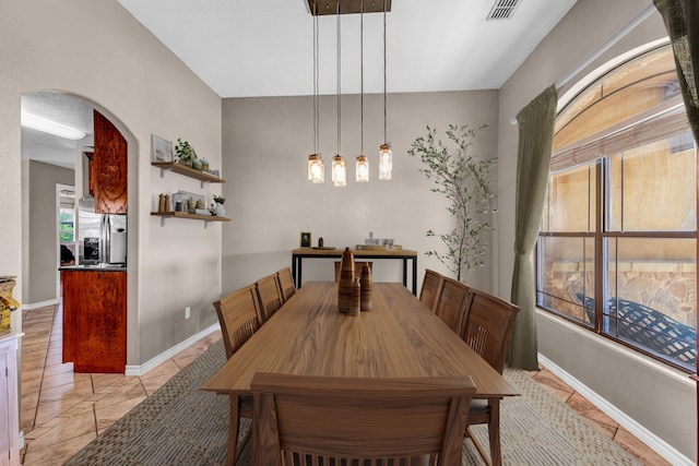 dining room with light tile patterned floors