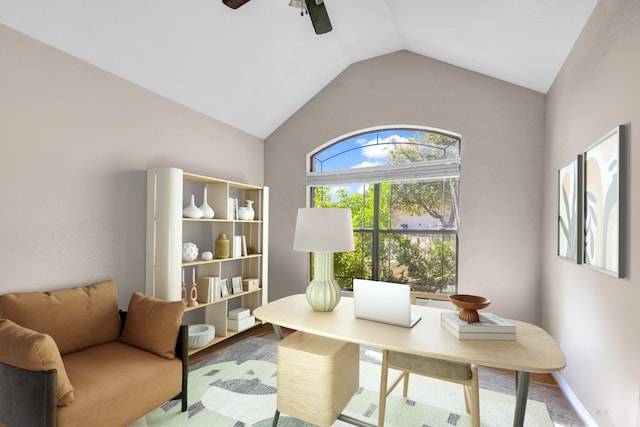 home office with ceiling fan, lofted ceiling, and wood-type flooring