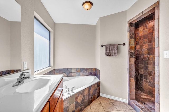 bathroom featuring vanity, tile patterned floors, and independent shower and bath