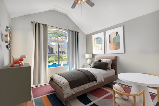 bedroom featuring lofted ceiling and ceiling fan