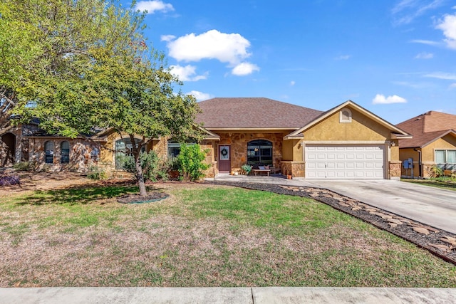 single story home with a garage and a front lawn