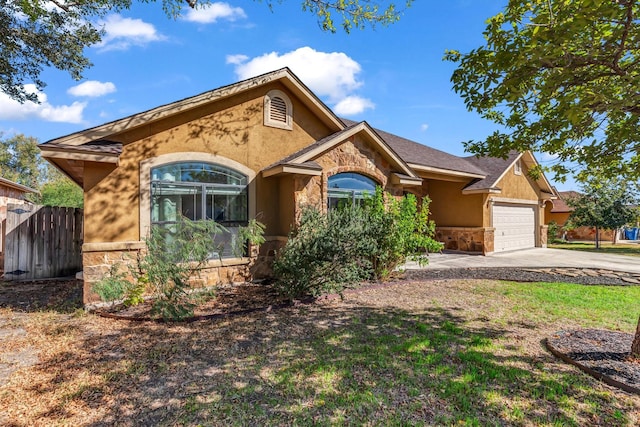 ranch-style home with a garage