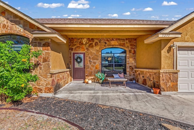 property entrance with a garage