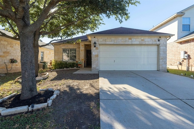 ranch-style house featuring a garage