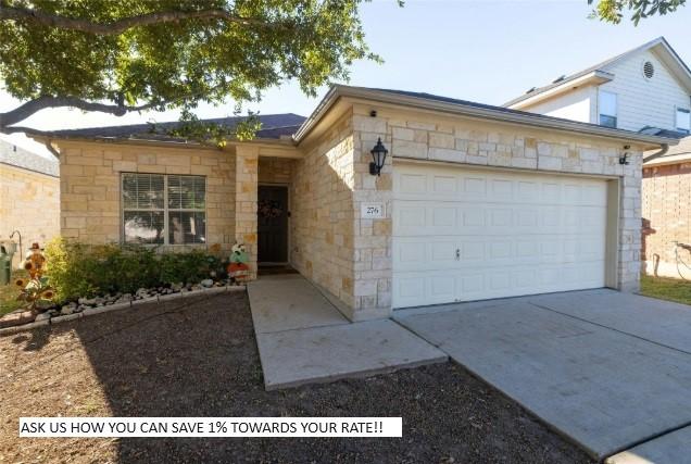 view of front of property featuring a garage