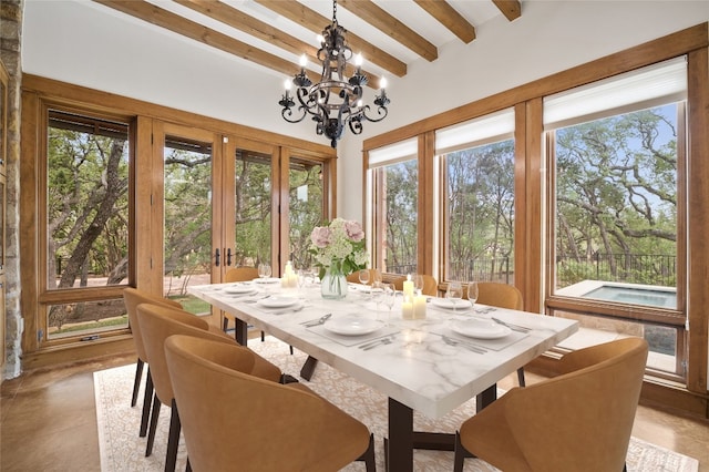 sunroom / solarium with beamed ceiling, french doors, an inviting chandelier, and plenty of natural light