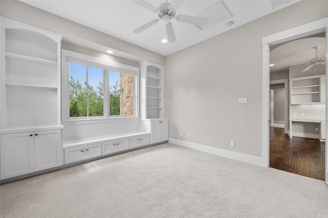 empty room with ceiling fan and wood-type flooring