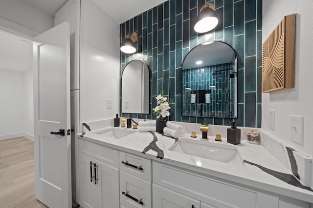 bathroom with wood-type flooring and vanity