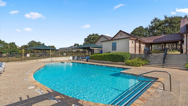 view of pool featuring a patio